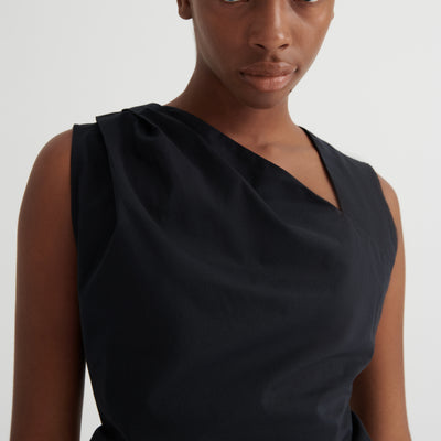 Genre Asymmetric Top