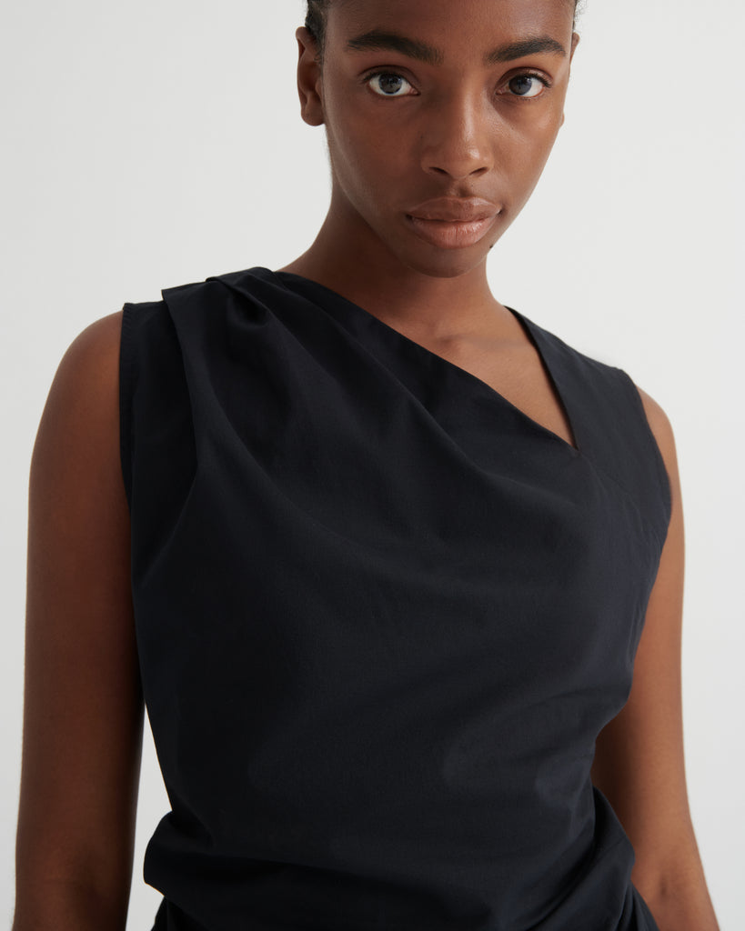 Genre Asymmetric Top