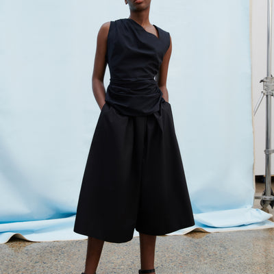Genre Asymmetric Top